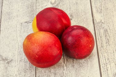 Tatlı olgun ve lezzetli Nectarine arka planda