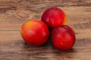 Tatlı olgun ve lezzetli Nectarine arka planda