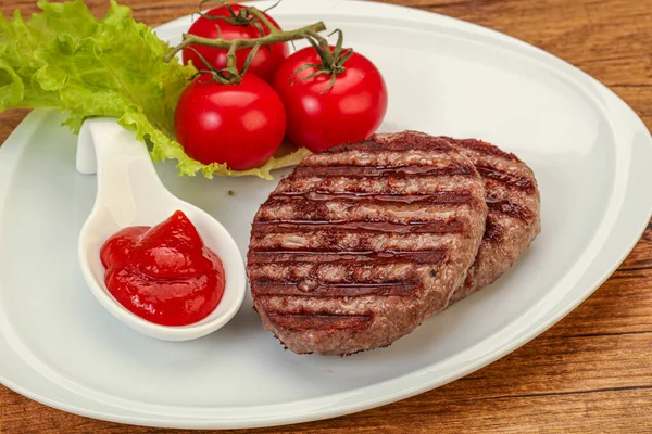 Chuleta Hamburguesa Plancha Con Salsa Tomate —  Fotos de Stock