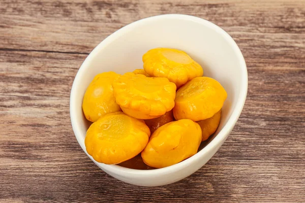 Vegetarian food - Marinated yellow patisson in the bowl