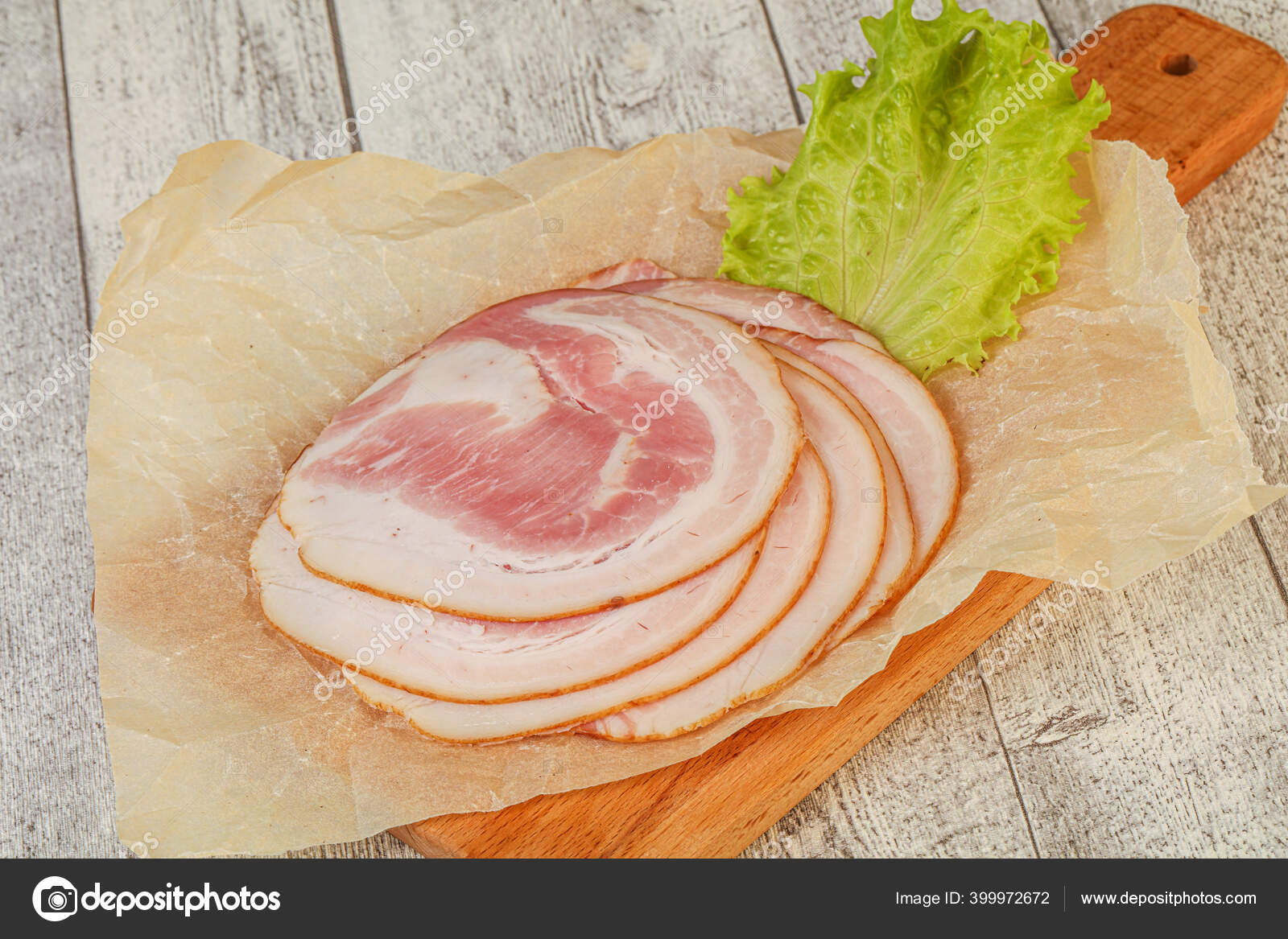 Sliced Italian Pancetta Sausage Board Stock Photo by ©AndreySt 399972672