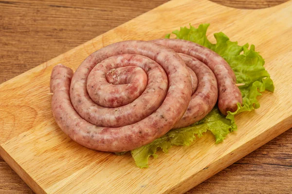 Raw pork sausage ring for grill