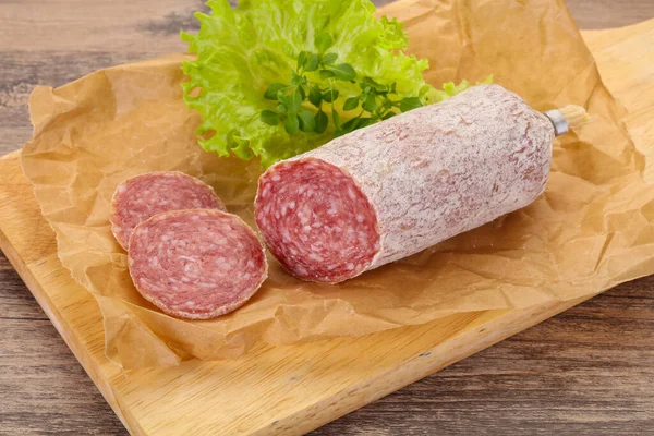 Italian Dry Saliami Pork Sausage Served Salad Leaves — Stock Photo, Image