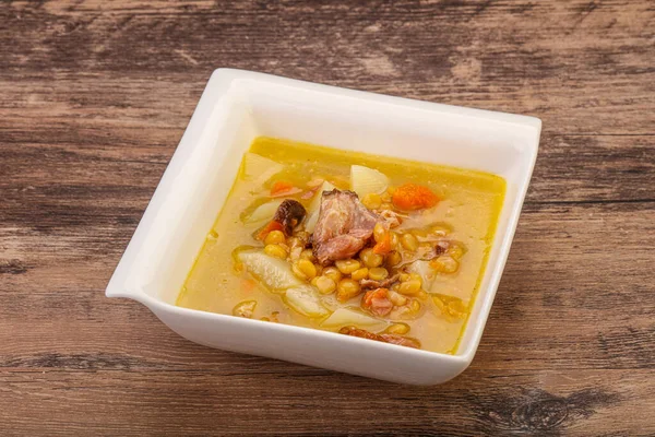 Pea soup with smoked pork ribs — Stock Image Pea Soup Smoked Pork Ribs Royalty Free Stock Photos