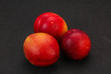 Tatlı olgun ve lezzetli Nectarine arka planda