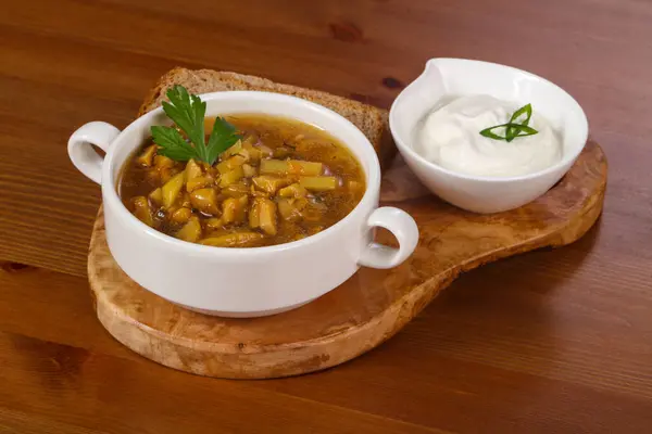 Wild mushroom soup with sour cream and herbs — Stock Image Wild Mushroom Soup Sour Cream Herbs Royalty Free Stock Photos