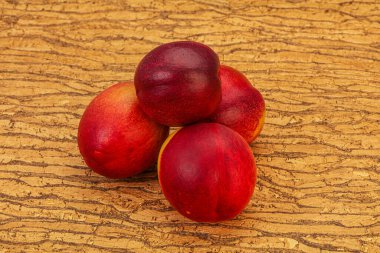 Tatlı olgun ve lezzetli Nectarine arka planda