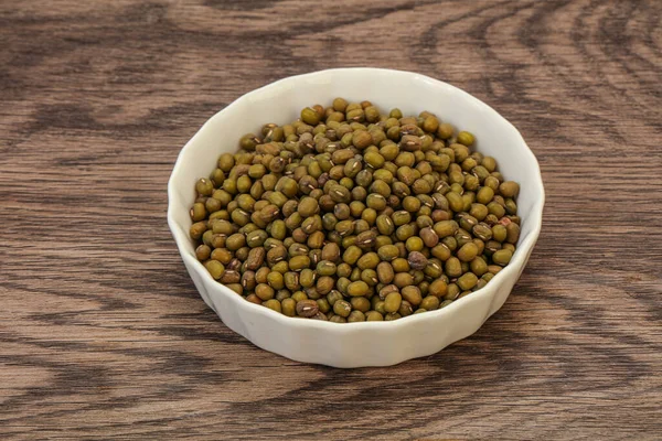 Vegetarian cuisine - dry green lentil for cooking