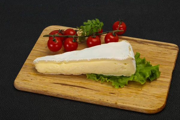 Brie cheese triangle served salad leaves