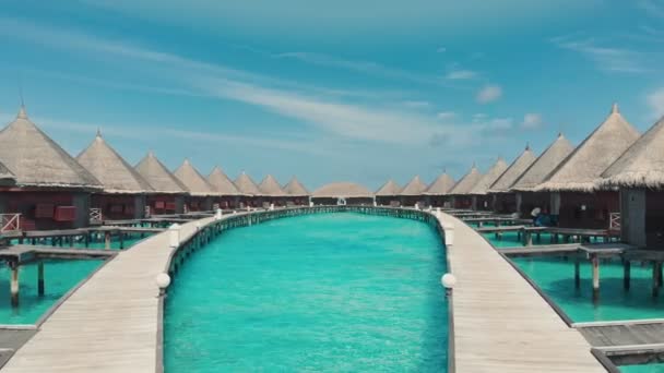 Slow Flying Low Altitude Jetty Luxury Water Villa Maldives Tracking — Stock Video