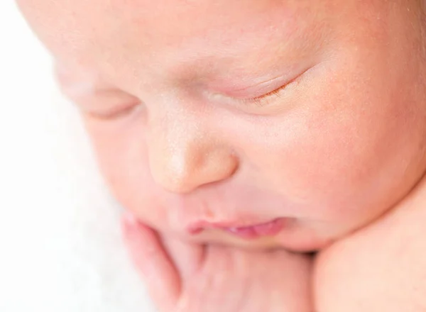 Close-up portrait of newborn babys face — Stock Photo, Image