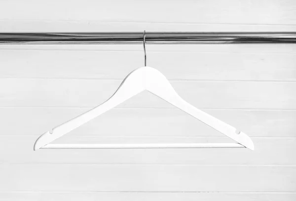 Chaotically places hangers on the rack — Stock Photo, Image