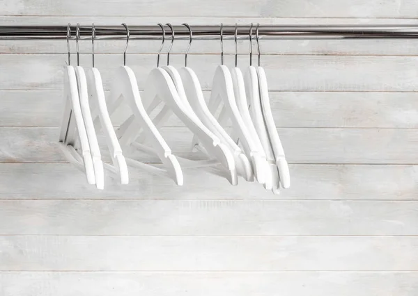 Chaotically places hangers on the rack — Stock Photo, Image