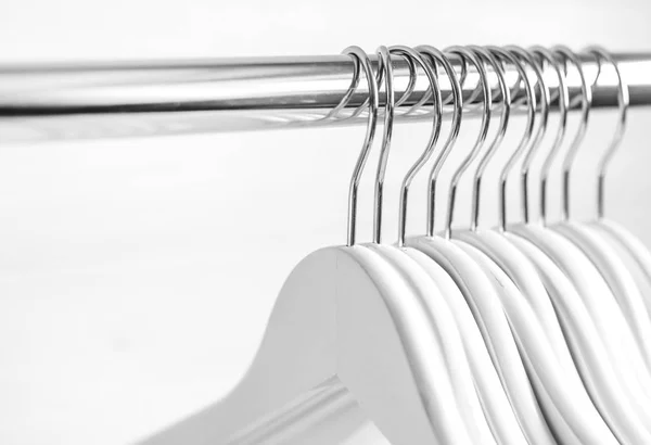 Chaotically places hangers on the rack — Stock Photo, Image