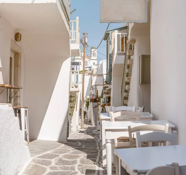 Narrow street with white houses, Greece