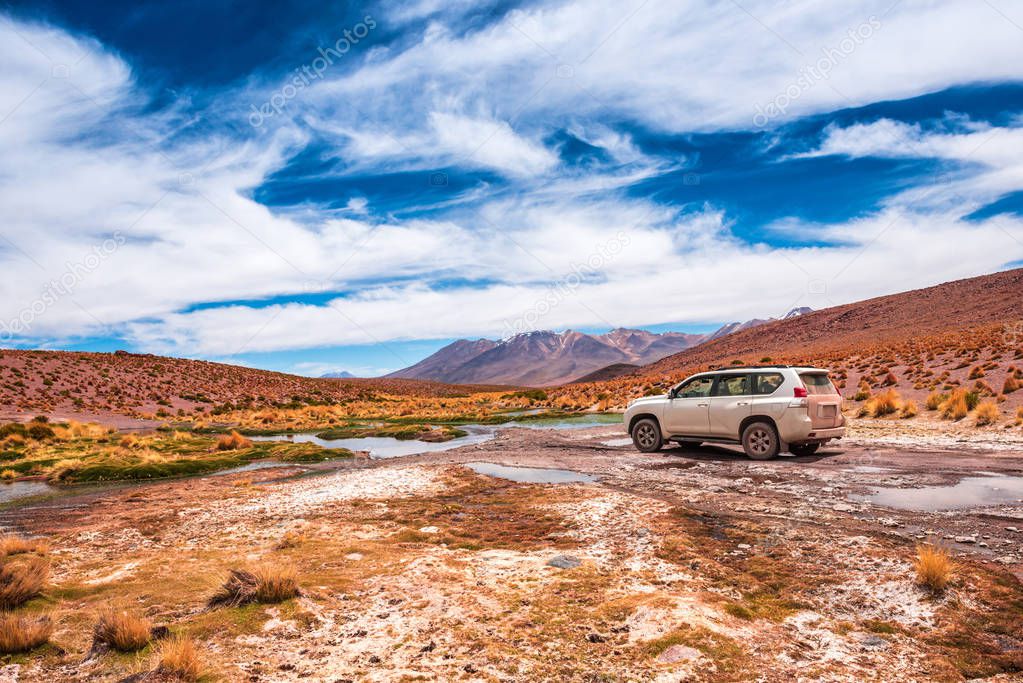 Car on the background of Bolivia landscape
