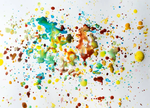 Kapičky barvy smíšené do Malování — Stock fotografie