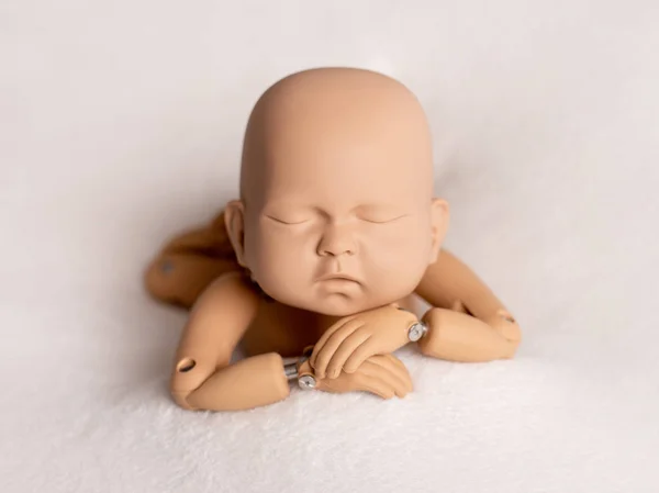 Mannequin of newborn for photo posing Stock Photo by ©tan4ikk