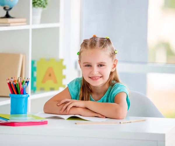 Portrait of cute little girl in school classroom — Stock Photo, Image