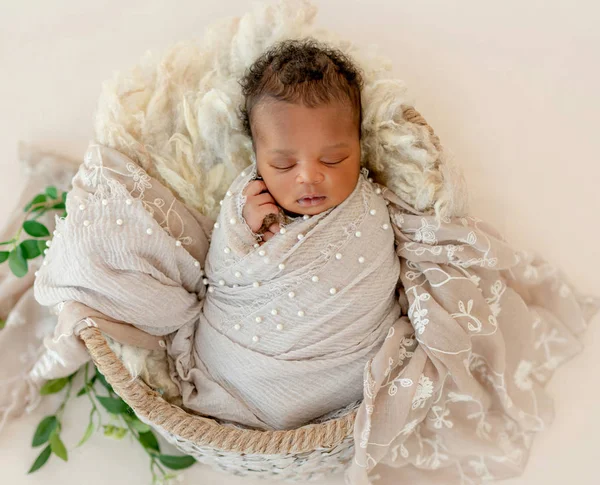 Newborn baby in basket — Stock Photo, Image