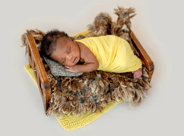 Newborn sleeping in cradle — Stock Photo, Image