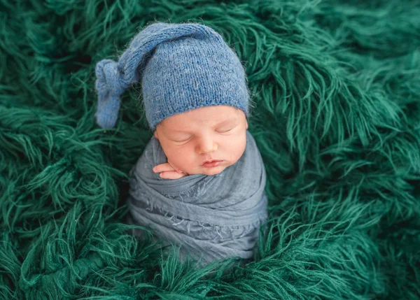 Newborn boy wrapped in a blanket — Stock Photo, Image