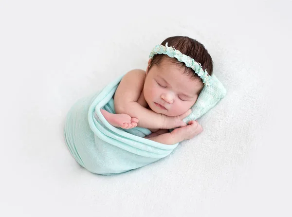 Cute newborn sleeping on tiny pillow — Stock Photo, Image