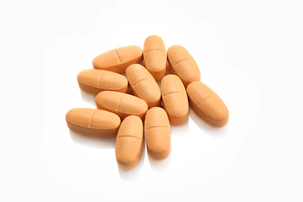 Heap Orange Pills Isolated White Background — Stock Photo, Image