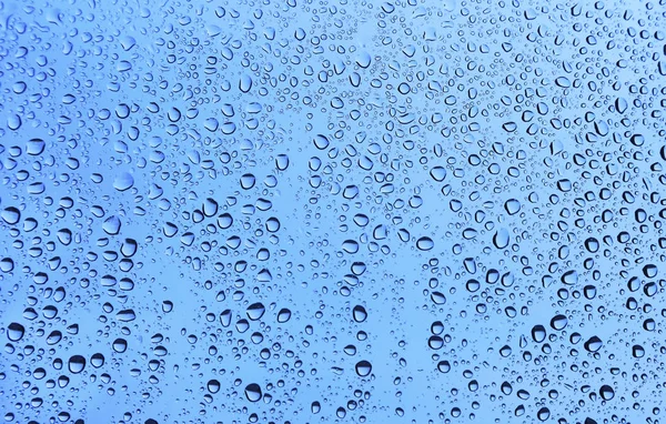 Water drops on glass, natural texture — Stock Photo, Image