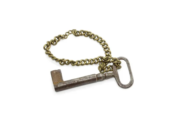 Very old vintage iron rusty key on a chain — Stock Photo, Image