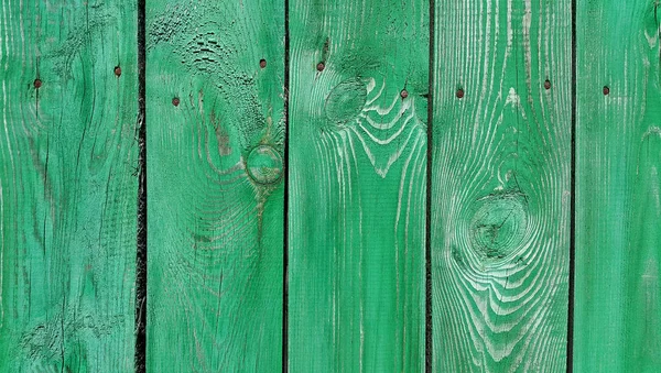 Textura da cerca pintada verde de madeira weathered — Fotografia de Stock