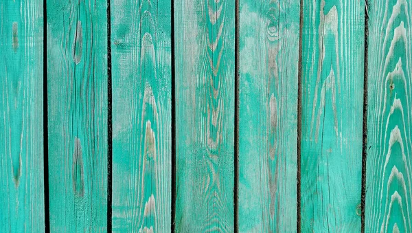 Textur der verwitterten Holz grün lackierten Zaun — Stockfoto