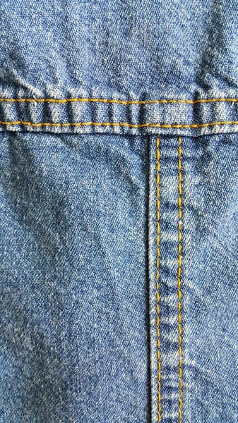 Текстура джинсовой одежды — стоковое фото