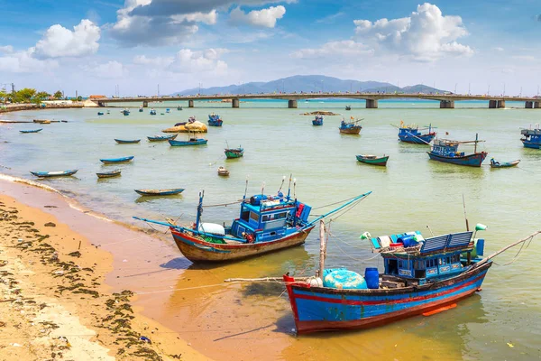 Bay with fishing boats in Nha Trang, Vietnam in a summer day