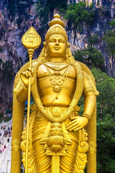 Statue of hindu god Murugan at Batu cave in Kuala Lumpur, Malaysia at summer day