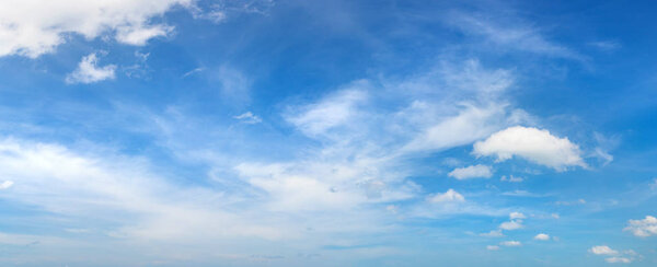 Blue sky panorama with clouds in a summer day