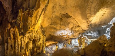 Panorama of Huge cave in Halon bay, Vietnam in a summer day clipart