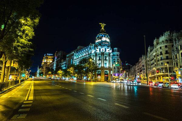 MADRID, SPAIN - JULY 11, 2014: Metropolis hotel in Madrid in a beautiful summer night on July 11, 2014 in Madrid, Spain