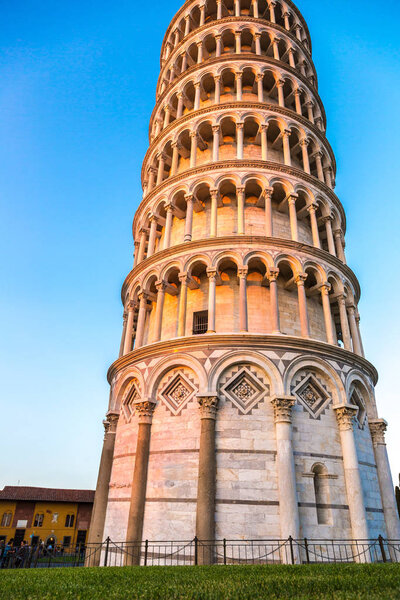 PISA, ITALY, JULY 11, 2014: Leaning tower in a summer evening in Pisa, Italy