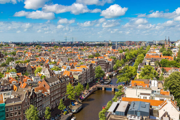 AMSTERDAM, THE NETHERLANDS - JUNE 16, 2016: Panoramic aerial view of Amsterdam in a beautiful summer day, The Netherlands
