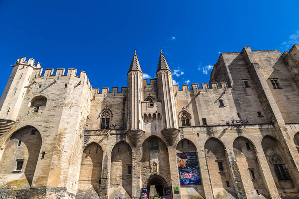 AVIGNON, FRANCE - JULY 11, 2016: Papal palace in Avignon in a beautiful summer day, France