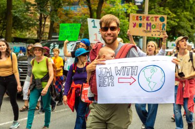 TORONTO, CANADA - SEPTEMBER 27, 2019: Global Strike for Climate and march for climate justice in Toronto, Ontario, Canada clipart