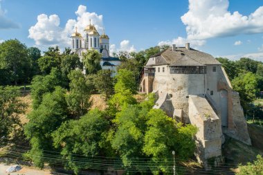 Aerial view of Ostroh Castle in Ostroh town, Rivne region, Ukraine. Travel destination and castles in Ukraine clipart