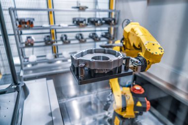 Robotik Kol üretimi modern endüstriyel teknolojiyi temsil ediyor. Otomatik üretim hücresi.