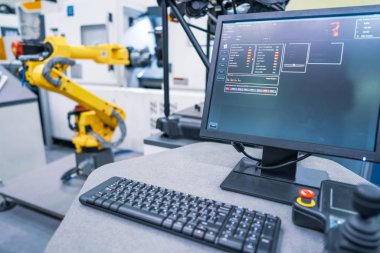 Robotik Kol üretimi modern endüstriyel teknolojiyi temsil ediyor. Otomatik üretim hücresi.