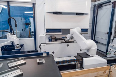 Robotik Kol üretimi modern endüstriyel teknolojiyi temsil ediyor. Otomatik üretim hücresi.