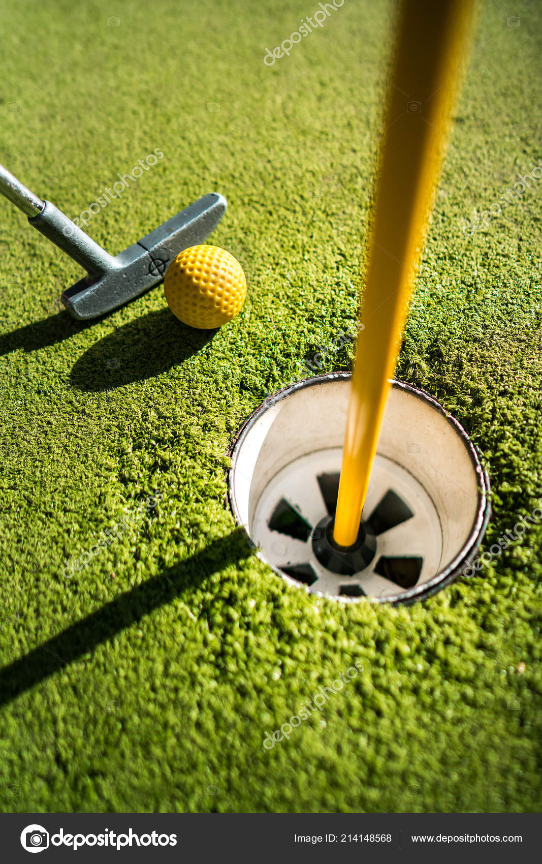 Mini Golf Yellow Ball Bat Hole Sunset Stock Photo by ©cookelma 214148568