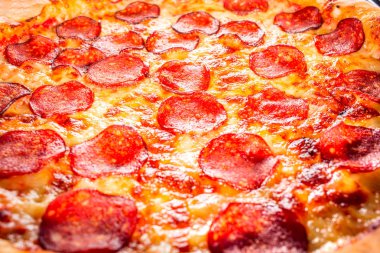 iştah açıcı arka plan pepperoni pizza closeup çerçeveyi dolduran.