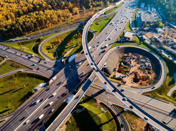 Aerial view of a freeway intersection traffic trails in Moscow.