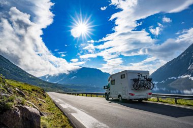 Family vacation travel RV, holiday trip in motorhome, Caravan car Vacation. Beautiful Nature Norway natural landscape. clipart